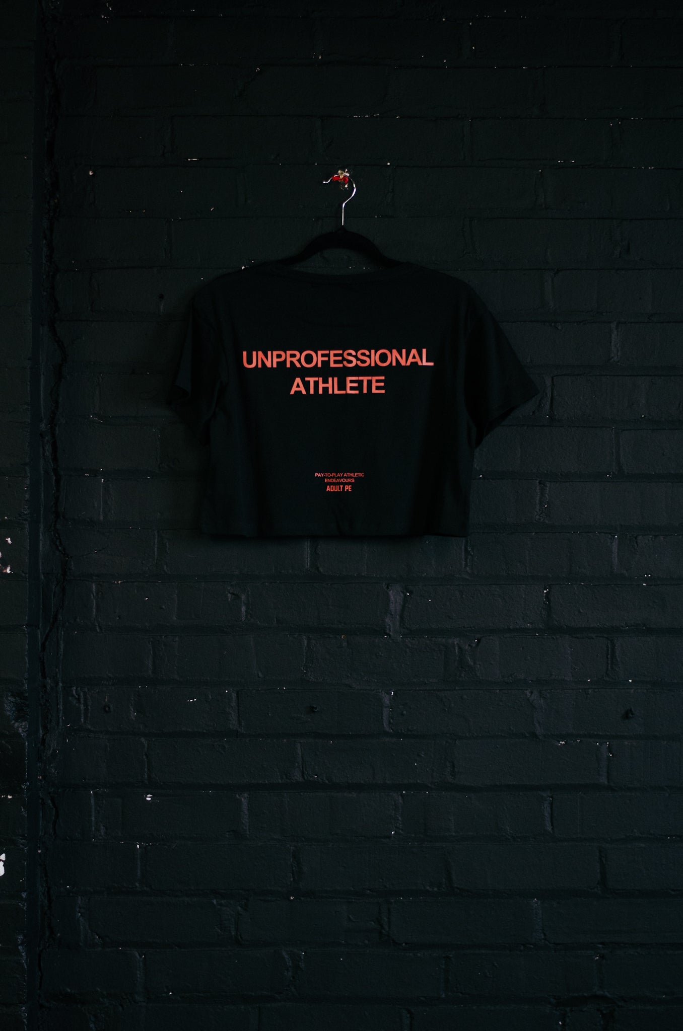'UNPROFESSIONAL ATHLETE' CROPPED TEE - BLACK